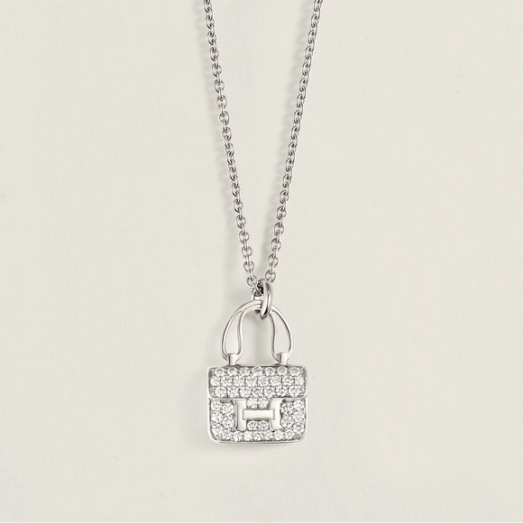 Hermes Jewelry - Hermes diamond Amulettes Constance necklace